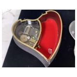 Antique heart-shaped music box