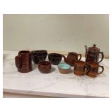Earthenware teapots and cups in brown color
