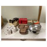 Vintage kitchen items including Seal A Meal Vegomatic serving pan Cor