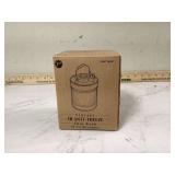 Vintage coin bank in the shape of a fist with new antifreeze design