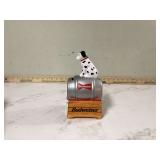 Collectible coin bank featuring Budweiser branding and a dalmatian