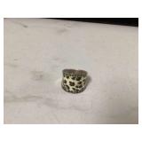 Silver ring with cheetah print design