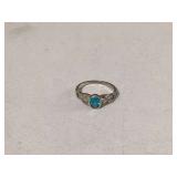 Sparkling aqua stone on silver band