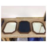 Three octagon mirrors with beveled edges and frames