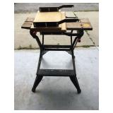 Folding workbench with storage shelves