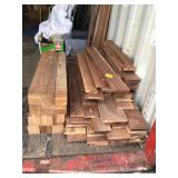 Assorted sizes of planed walnut boards