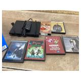LG DVD player with remote control and assortment of DVDs Powers on and door