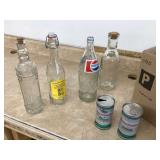 Old glass bottles insulators stones