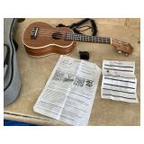 Ukulele set with tuner case papers