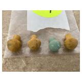 Tiny stone mushroom figures