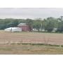 141 acre farm with home and farm buildings