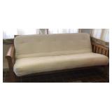 Wooden Mission style futon with ivory pad