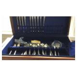 Silverware set, marked Heirloom Plate, with chest