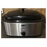 Oster  22 qt roaster oven,