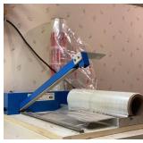 Central City  shrink wrap system. Description;