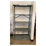 Metal 4 shelf storage unit. 3 x 511' tall 18'