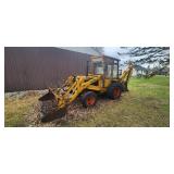 Case 580 Construction King  back hoe with cab, 24” digger bucket, 6’ loader, 2 wheel drive