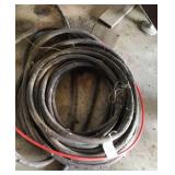 Approximately 100ft of heavy rubber hose