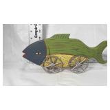 Wooden rolling fish toy