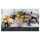 25 various small bean filled stuffed animals