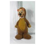 Hard stuffed bear with plastic face toy