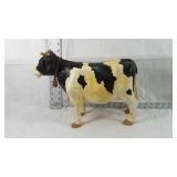 Mechanical like cow toy with a bell