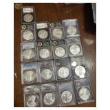 several Ms 70 graded coins