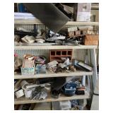metal shelfing full of plumbing building supplies