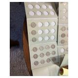 Several silver walking liberty coins 