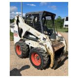 bobcat s175 skidsteer with pallet forks and bucket