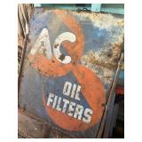 Ac oil filters and spark plug sign 