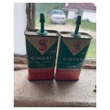 Vintage tin oil cans 