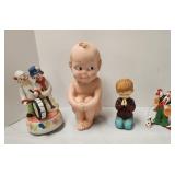 Clown music box, Kewpie bank, figurines