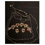 Black glass beads and matching earrings and