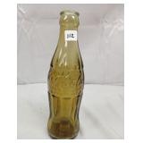 Off-Colored Coca-Cola Bottle