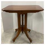 Antique Eastlake Style Table on Porcelain Casters