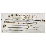 Costume necklaces, brooches