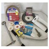 Plumbing items, wrench, pipe auger