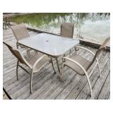 Glass top table, 4 chairs for patio