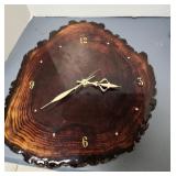 Clock on wood slab with bark