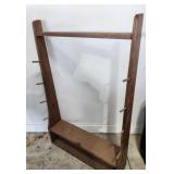 Homemade wood rack, fishing poles?