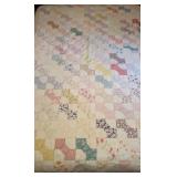 Antique cotton bow tie quilt