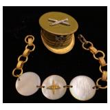Military hat pin and mother of Pearl bracelet