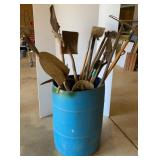 Plastic Barrel of Long Handled Tools