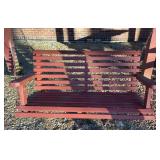 Wooden porch swing