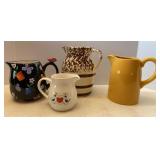 Lot of Various Size Water Pitchers