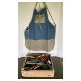 Gardening apron and wood box of tools