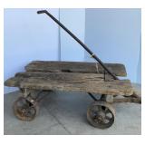Primitive cart with cast iron wheels and handle