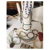 Bracelets, beads, some stretch,