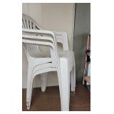 3 plastic patio chairs